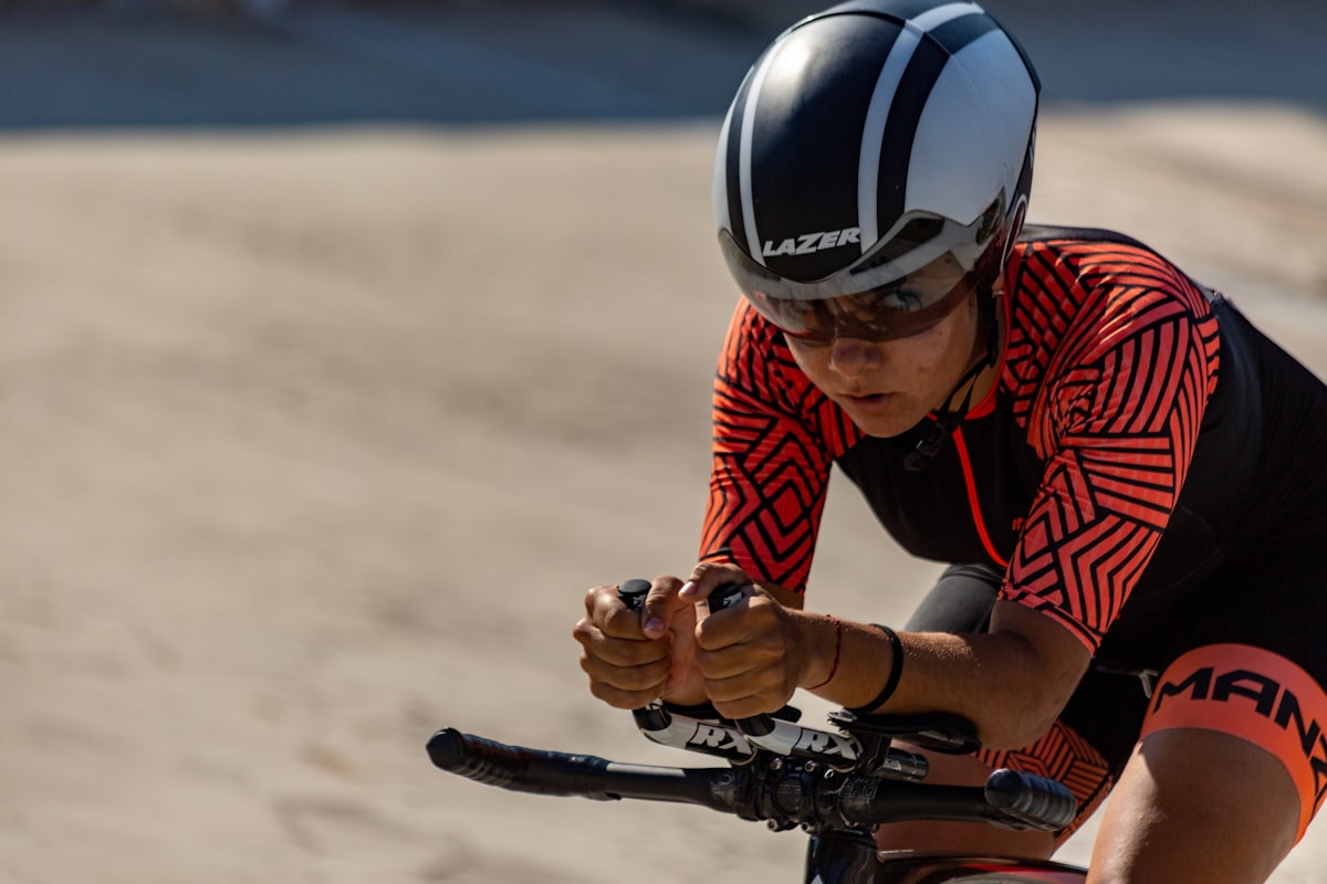 Cyclist in aero position riding hard — power data from a GPS computer is the most important metric for pacing long efforts