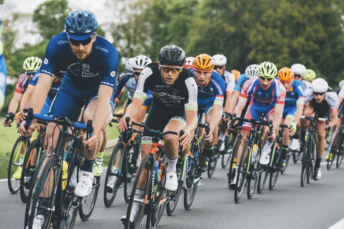 Road cycling peloton in full race action